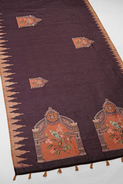 Brown Mughal Bird Print Handwork Chanderi Cotton Saree . Decorative purple fabric with intricate orange patterns and designs on a white background
