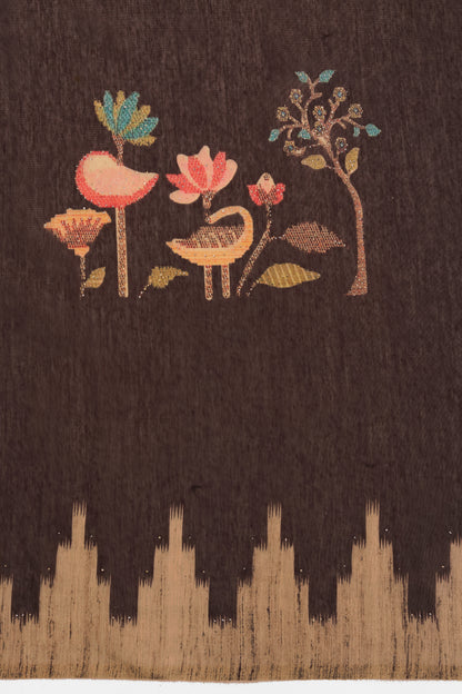 Brown Bird & Tree Handwork Saree | Yuvani Vesture Embroidered design of flowers and a swan on a dark fabric background