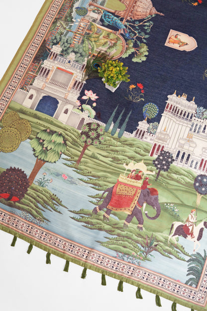Decorative rug with intricate design of an elephant, people, and landscape.  Baagh Mahal Chanderi Saree | yuvani vesture
