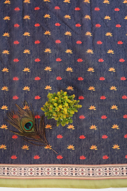 Fabric with peacock feather and floral pattern on a blue background  Baagh Mahal Chanderi Saree | yuvani vesture