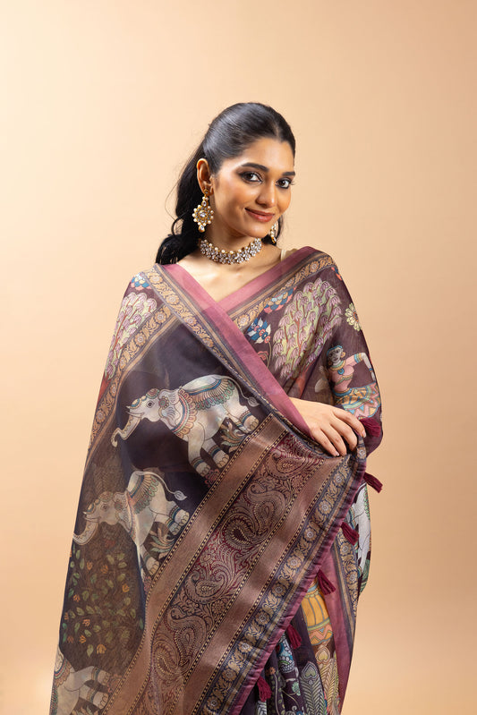 Woman wearing a traditional saree with intricate patterns on a beige background Gajleela Chanderi Saree |   Yuvani Vesture