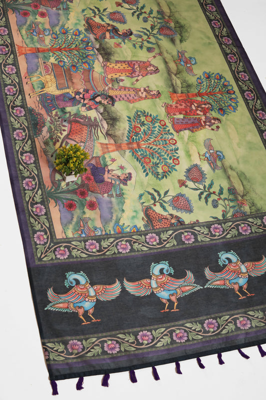 A detail of a green Chanderi cotton saree with Madhubani-inspired prints, featuring village scenes, birds, and artistic motifs. Madhuban Chanderi Saree | Yuvani Vesture