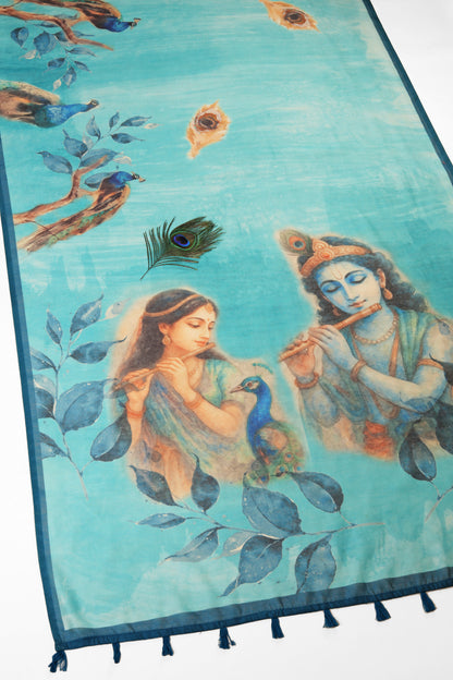 Tapestry with artistic depiction of two figures and peacocks on a blue background Mor Bansi Blue Chanderi Saree | Yuvani Vesture