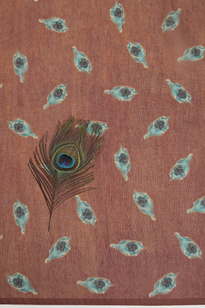 Peacock feather design on a patterned fabric background Mor Bansi Yellow Chanderi Saree | Yuvani Vesture