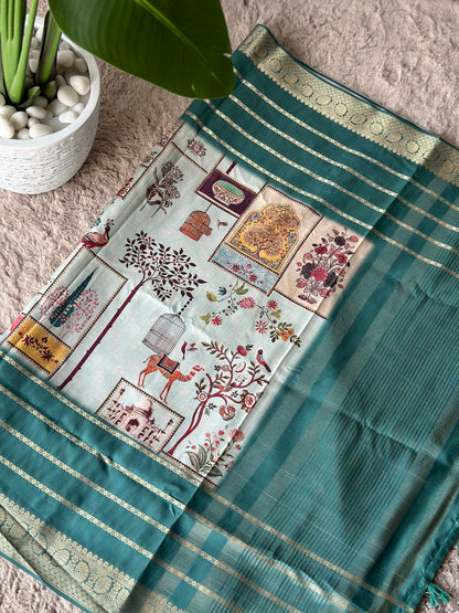 A jacquard silk blend saree with a blend of heritage and elegance design, featuring motifs of camels, floral patterns, ornate cages, and Mughal architecture. Raj Bhavan jacquard silk saree