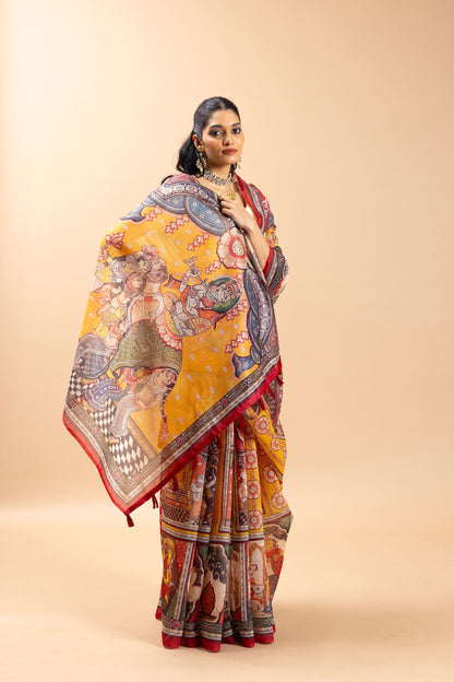Woman wearing a colorful saree with intricate patterns on a beige background Rang Gajraj Chanderi Saree | chanderi cotton saree | Yuvani Vesture