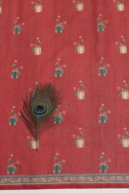 Red fabric with peacock feather design and small floral patterns on a red background Vrindavan Leela Red Printed Saree | Yuvani Vesture