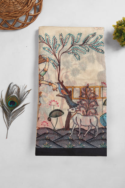 Decorative towel with nature-themed design featuring a deer, tree, and flowers on a white background. Vrindavan Vaas Chanderi Saree | Yuvani Vesture